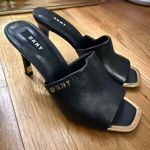 DKNY Black Heeled Mules with Gold Accents
